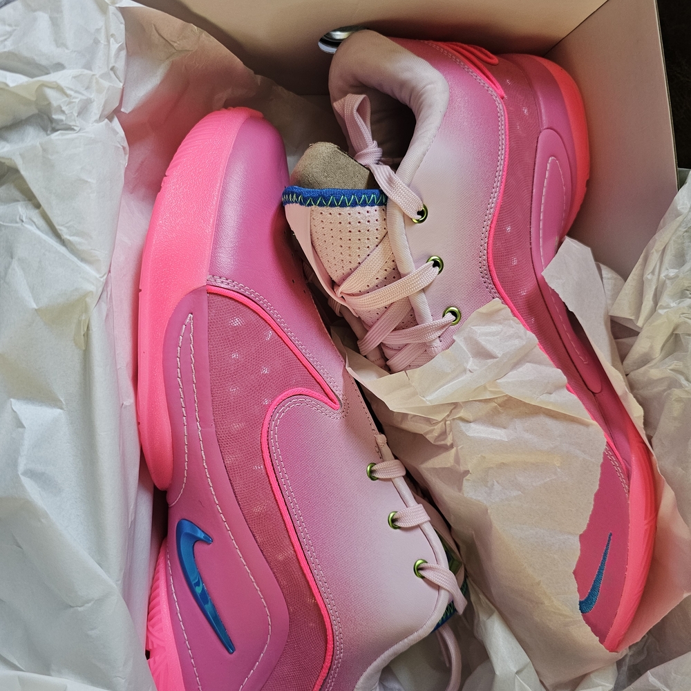 Nike Vibrant Pink Athletic Shoes with Blue Accents